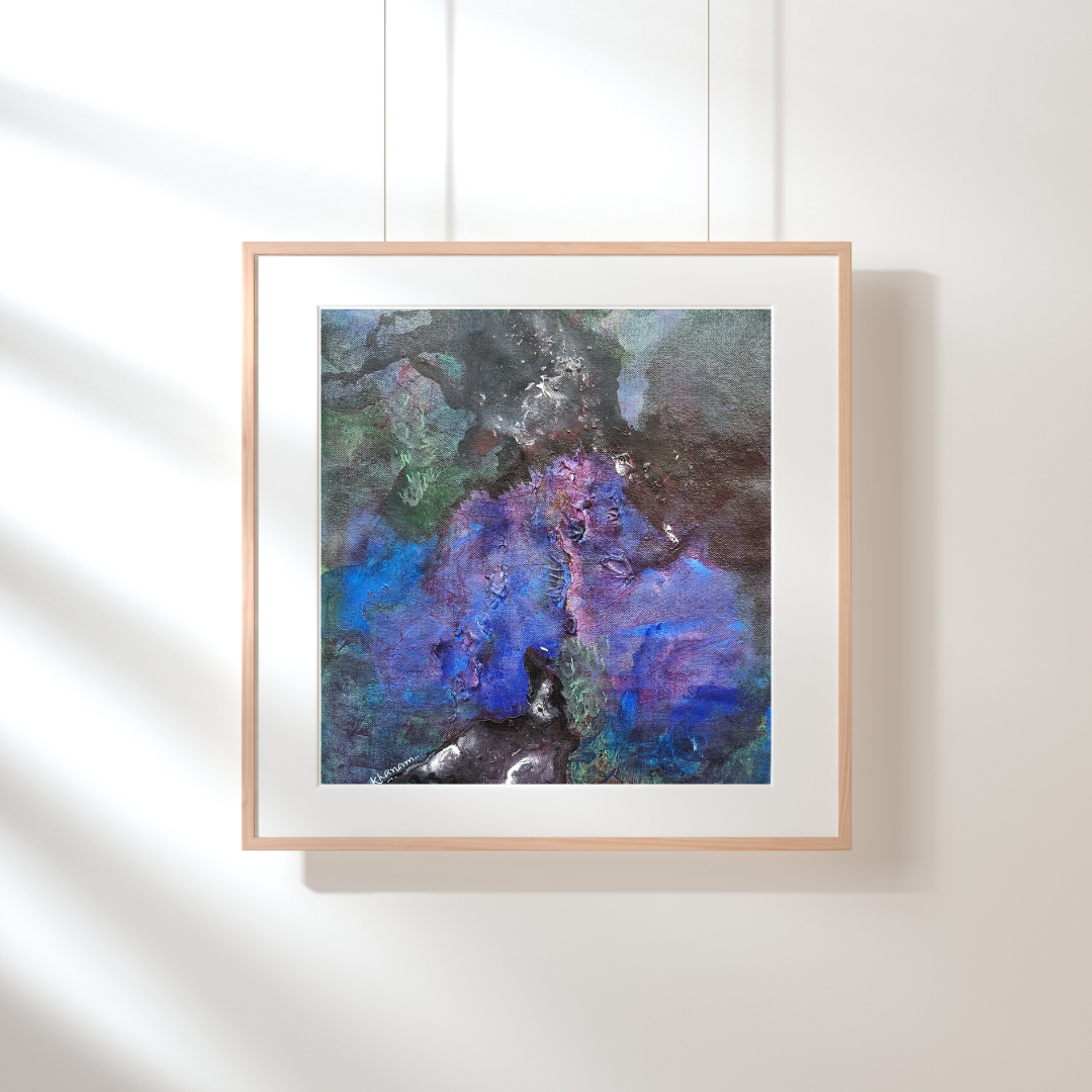 Framed abstract painting with a wooden frame on a white wall