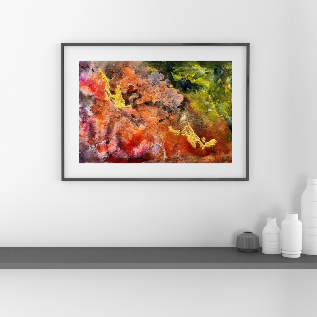 Framed abstract painting with vibrant colors on a white wall.