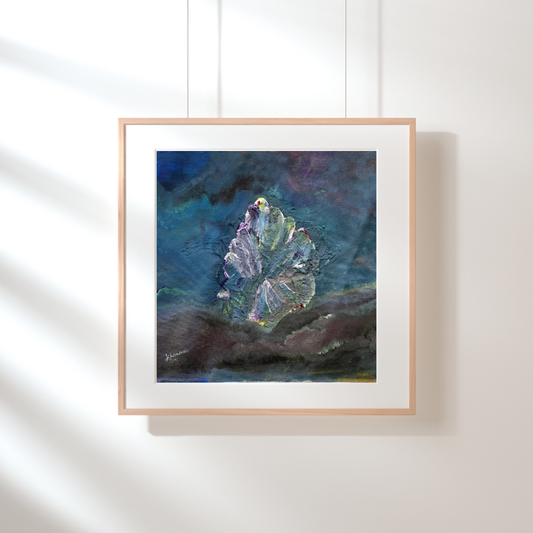 Framed abstract painting on a white wall